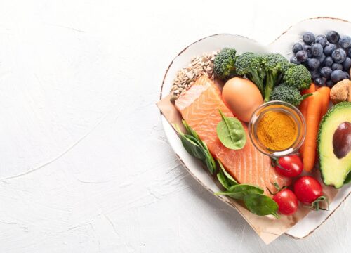 Photo of nutritious foods in a heart-shaped bowl
